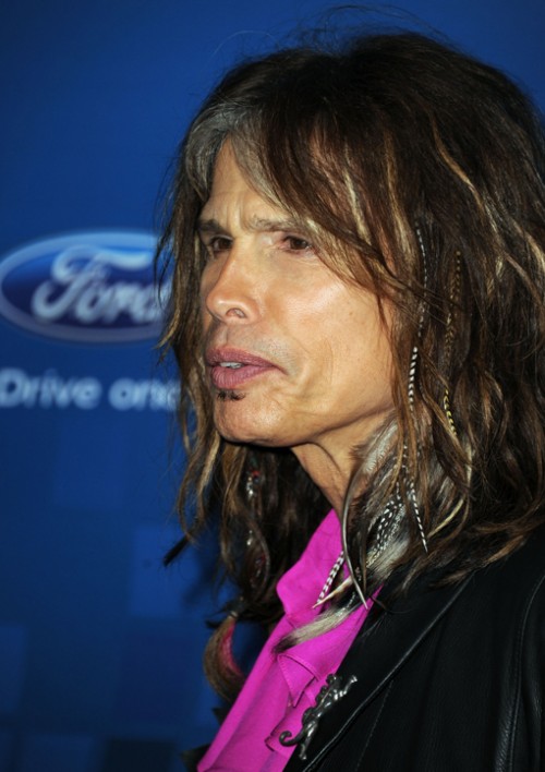 feather hair extensions michigan. Steven Tyler wears Feather#39;s